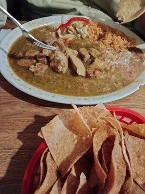 This is the chili Verde plate. Pork meat soaked in amazing green sauce served with fresh beans and rice. Fresh hand made flour tortillas.