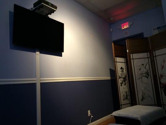 Reflexology room with flat screen