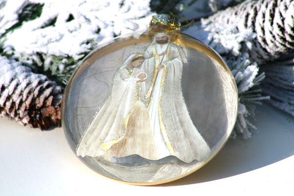 Beautifully designed Holy Family and Angel disc ornaments to celebrate the true meaning of Christmas