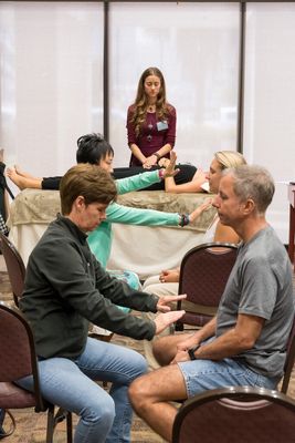 Jacquelyn teaching Reiki