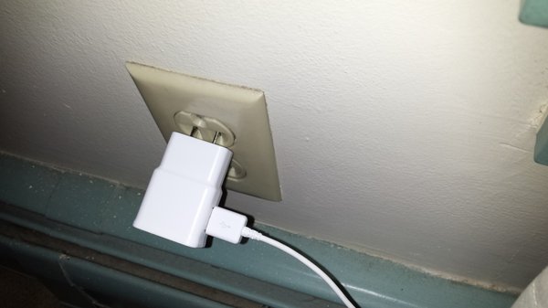 Charger kept falling out of receptacles in room