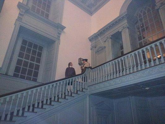 Jefferson and Adams on the stairs debating