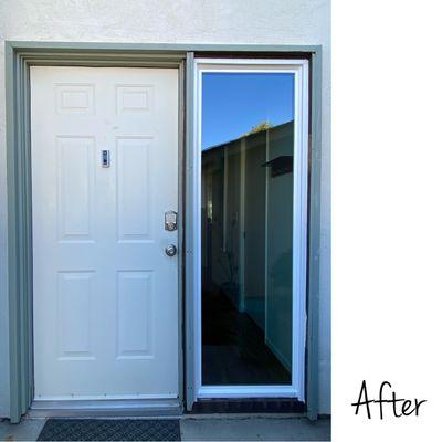 Front entry with new Anlin white vinyl window.