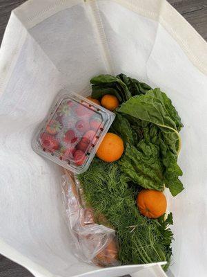 Bag for 2: green garlic, mandarins, oranges, strawberries, carrots, fennel, parsley and chard