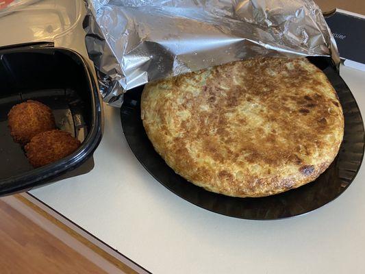 Classic Spanish tortilla (omelet) and ham and cheese croquettes