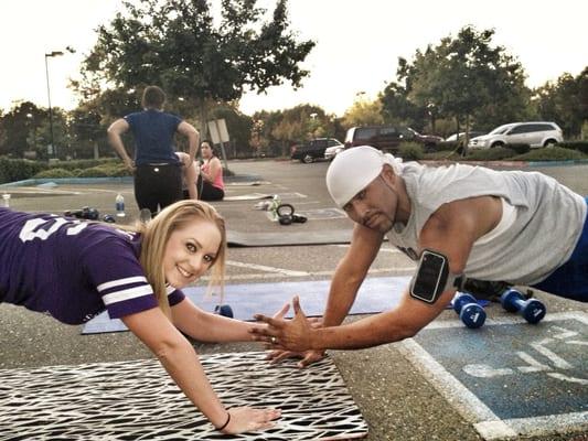 Staci and donix doing partner clap push-ups