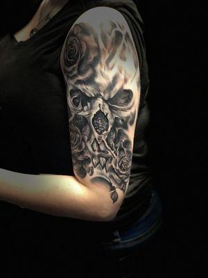 Completely freehand skull and rose tattoo by Chris