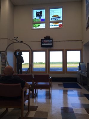 Lovely little airport sadly ruined by the sound of a television spewing dismal news.  Why do we have to have tv everywhere?