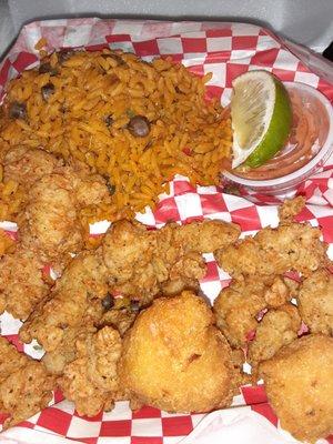 Fried conch with pigeon peas and rice