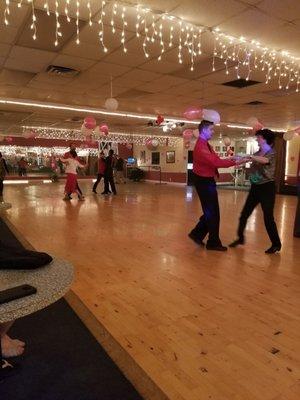 Dancers on the floor.