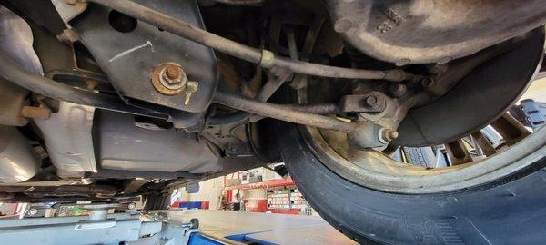 bent rear suspension control arm (also wrong part on right side vs left) doesn't allow for proper alignment unless replaced