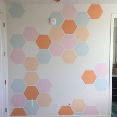 Honeycomb design for model home babies room. Hip, soft colors!