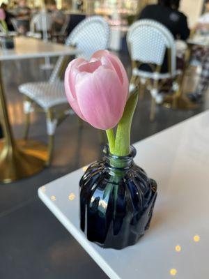 A lovely fresh (real) tulip at every table.