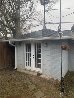 Gutters with downspout.