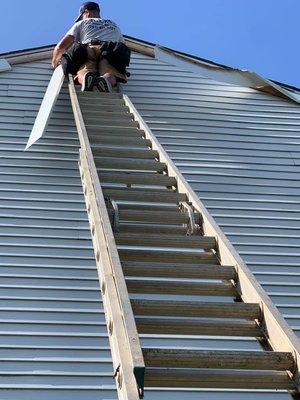 Why climb tall ladders? We are pros and will fix or replace siding, fascia, or flashing for you!