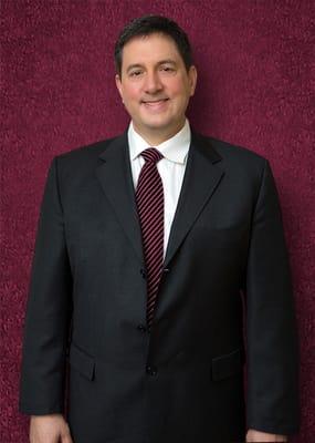 William J. Garces, Esq. - Senior Partner