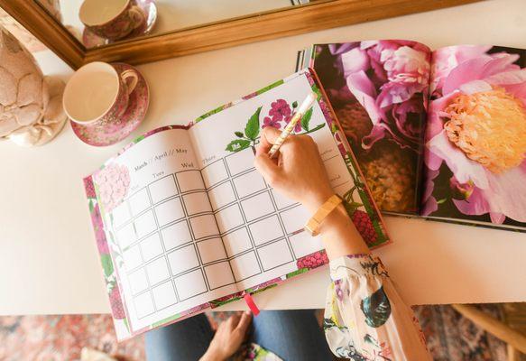 The SPRING planner book of the May + October Seasonal Self-Care Planner®