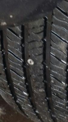 Nail in tire .