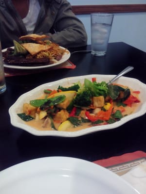 Veggie Tofu in Curry sauce &  combination plate with crab ragoons ,beef teriyaki, on bed of Noodles