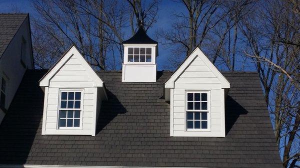 Hardie Plank Fiber Cement siding and composite Cedar Shake roof. Color Aged Cedar