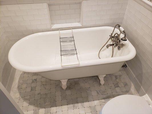 Original Clawfoot Tub in a freshly remodeled bathroom.