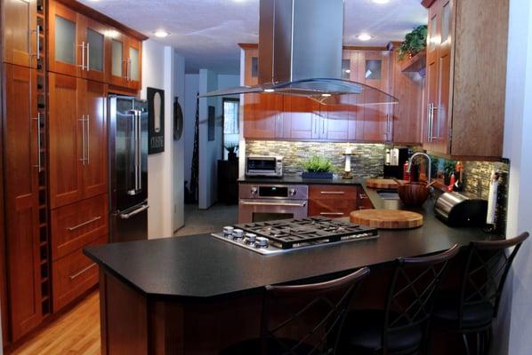 New custom cherry cabinets with island hood