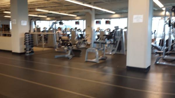 Inside the rec center: indoor track and some of the equipment and treadmills.  The free weights are behind me