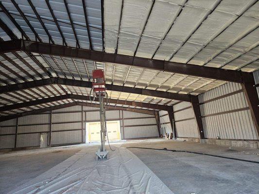 Spray foam on roof deck of commercial building