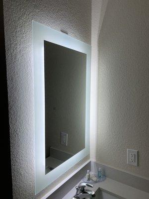 Back lit vanity mirror.