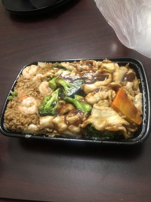 Shrimp fried rice and chicken and broccoli.