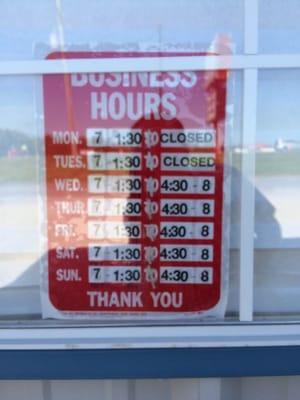 Posted business hours as photographed on 4/30/2015.