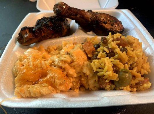 Dinner plate. Spanish rice, baked Mac and cheese, Lemon pepper chicken in butter sauce