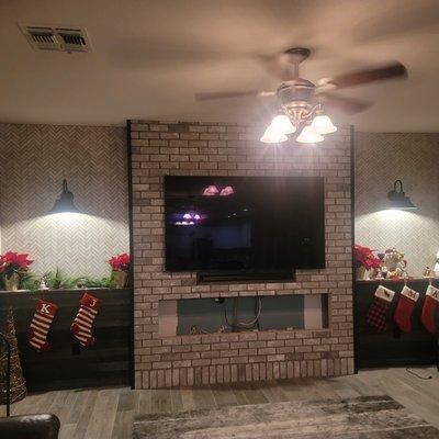 Sconces turned out nice on both sides of tv