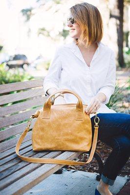 Small Madray Bag in Camel Leather with shop owner Elizabeth Seeger.