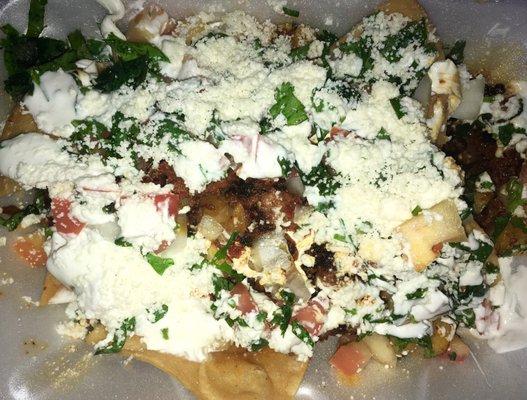 Al pastor nachos. I have no idea what the hell was all on these but it was good. Follow us on Instagram! @whererosiegoes