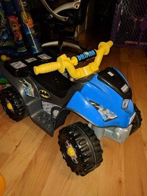 Power Wheels Batman ATV - $20 and works great! Really jealous of my kid right now. (Yes, mama tried to take it for a spin.)