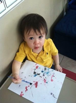 Water color painting time at Susan's Daycare.  They send children's art work home all the time.