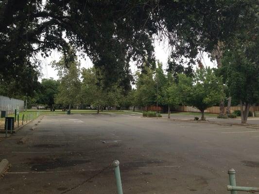 Ample parking because nobody is here... There's no electricity going to the tennis courts, I think this is an abandoned park :(