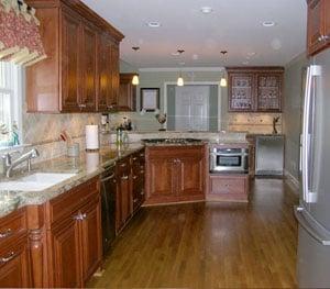 Kitchen remodel with hardwood floors, marble countertops and more