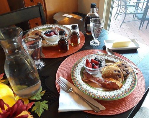 Sourdough blueberry pancakes with bacon plus fruit & yogurt. My breakfast included with room at The Raven B&B.