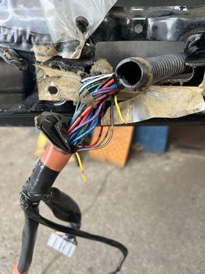 If you look close, you can see the burn arc on the yellow wire. This has been reconnected, wrapped, and put back exactly HOW it should be.