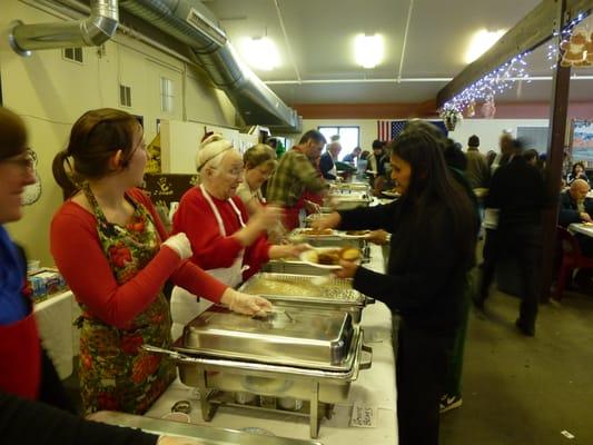 Serving meals at Bean's Cafe