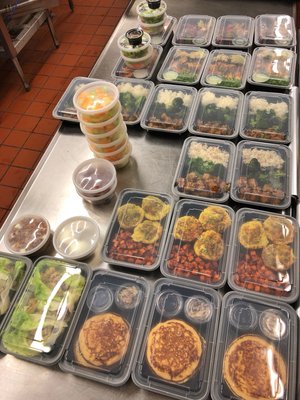 We pack all of our meals in reusable containers which contain front label with ingredients, reheating instructions, and nutrition label.