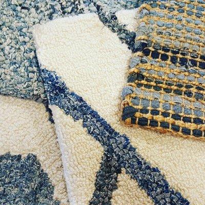 upcycled denim, natural jute, recycled plastic bottles