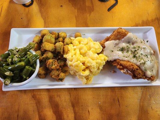 That's green beans, fried okra, mac & cheese, and chicken fried chicken