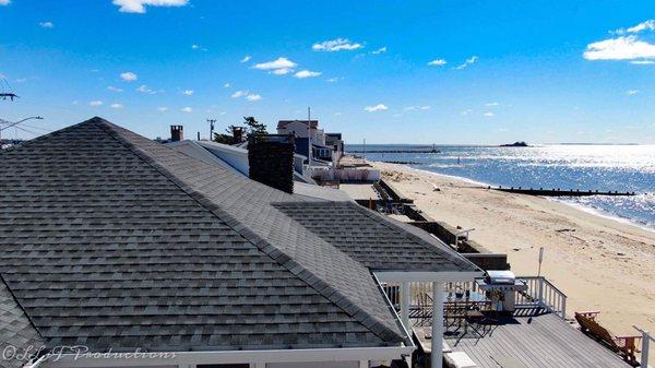 Drone shot over the roof top! Get a peak of Westbrook, CT Shoreline at this beautiful beach house.