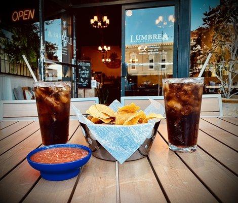 Chips and salsa with Coca Cola