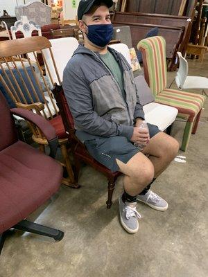 My silly husband in the chair we almost bought.