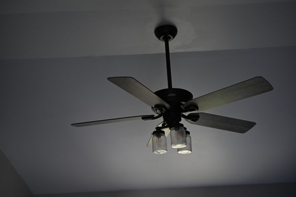 Installed ceiling fan on vaulted ceiling.