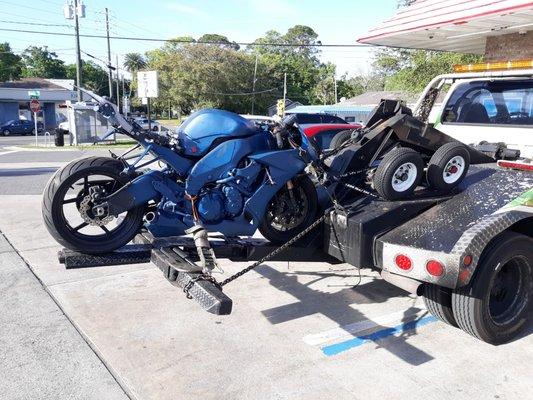 Motorcycle stolen about a year ago. Towed it back to the owner today.